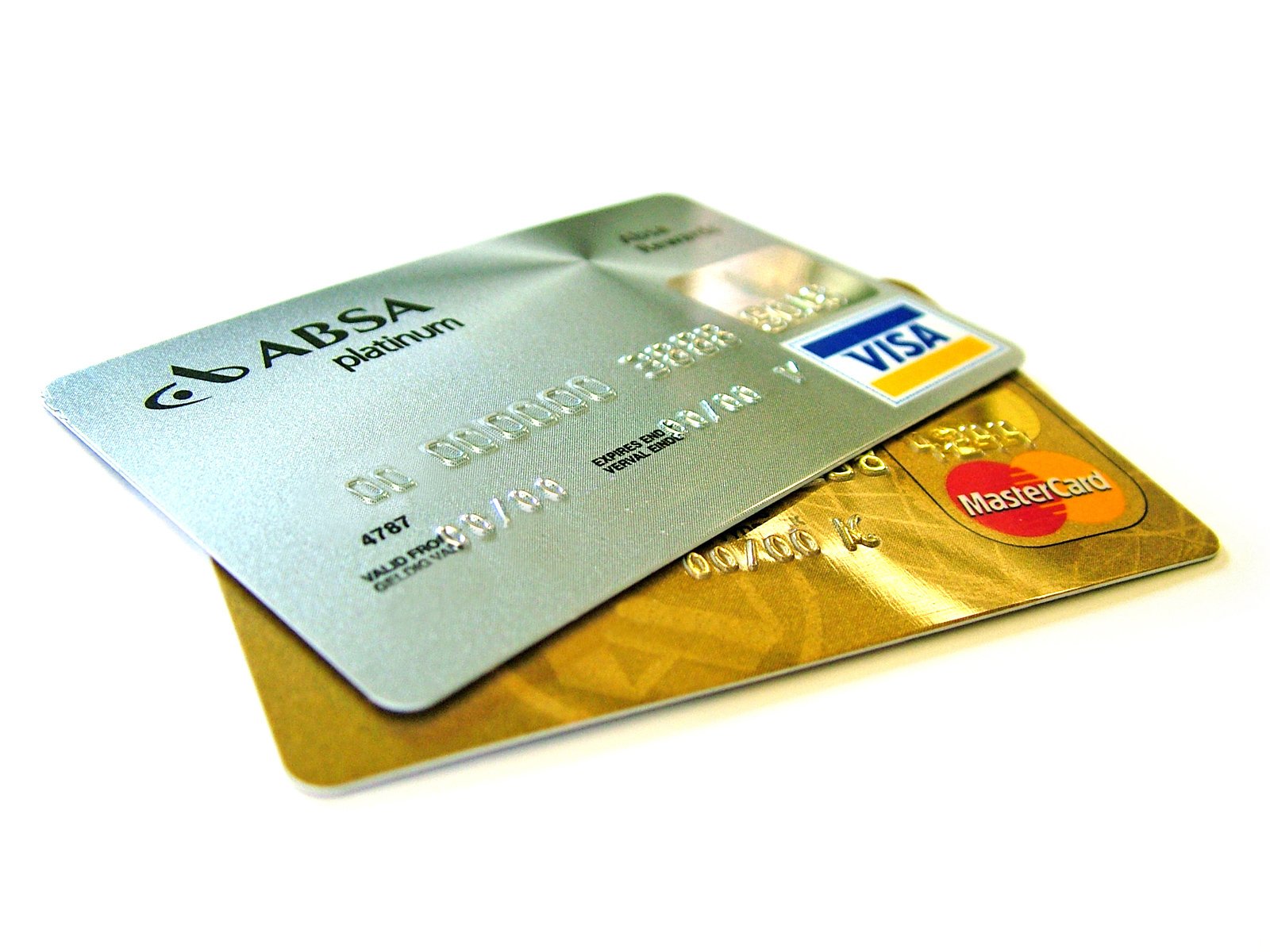 Two credit cards stacked on top of each other on a white background.