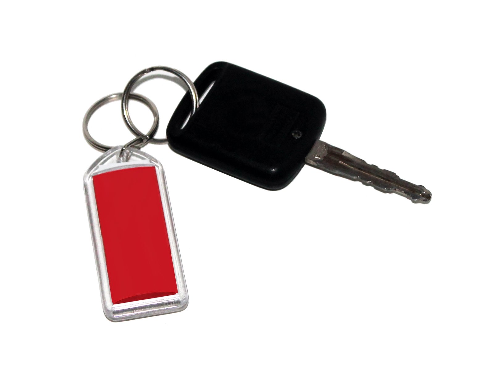 A car key on a ring with a red key tag.