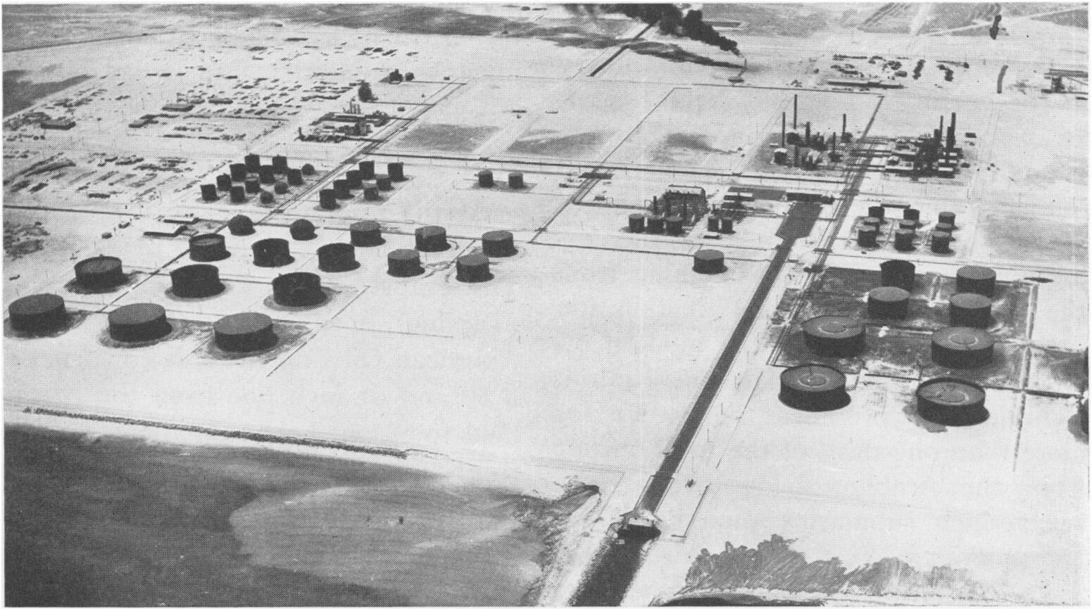 Aerial view of Saudi Aramco's Ras Tanura refinery and oil tank farm on the Persian Gulf