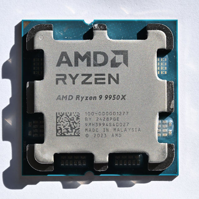 AMD branding on a Ryzen 9 9950X processor photographed in November 2024; company product illustration, not a Meta data-center chip