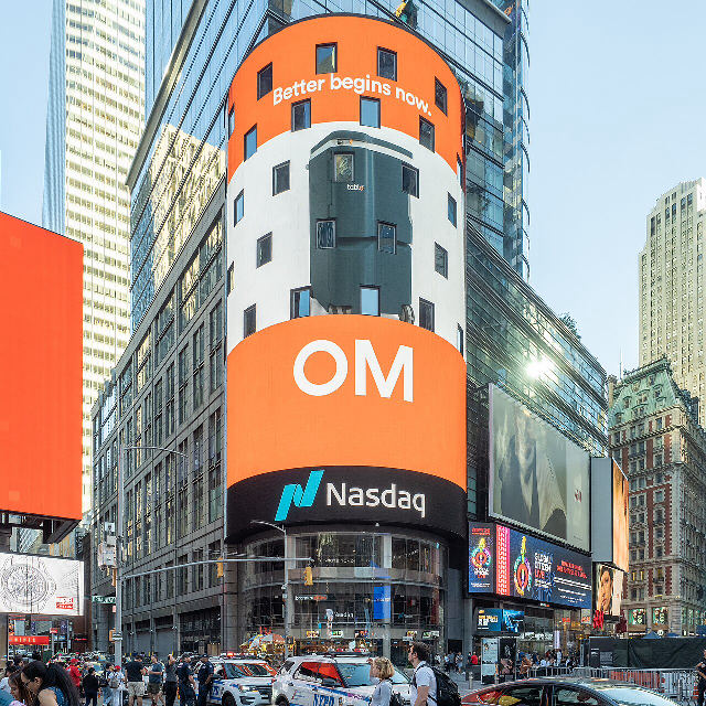 The Nasdaq MarketSite tower in Times Square with the Nasdaq logo on its digital display